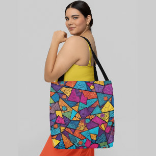 A colourful abstract pattern composed geometric tote bag