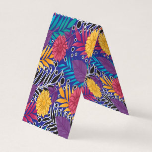 a colourful flower and leaves pattern on a blue ba business card