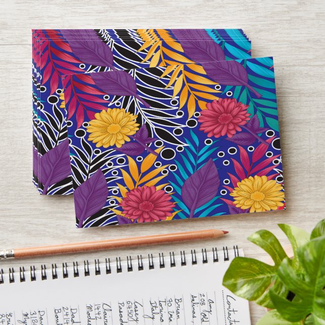 a colourful flower and leaves pattern on a blue ba envelope (Stacked)