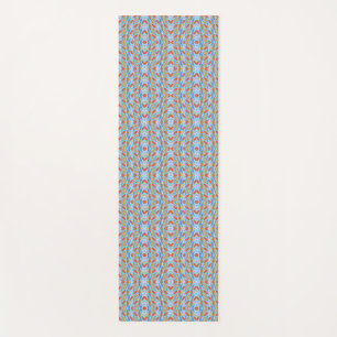 A colourful geometric pattern features repeating yoga mat