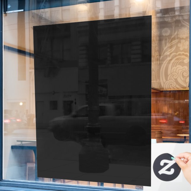 A completely black image with a subtle textured  window cling (Cafe Window)