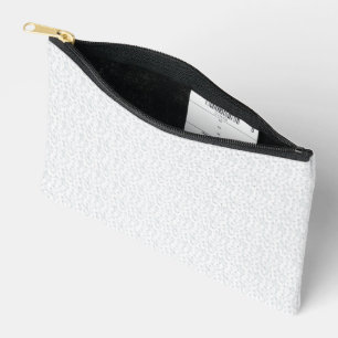 A completely white, featureless surface fills the  accessory pouch