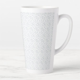 A completely white, featureless surface fills the  latte mug