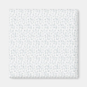 A completely white, featureless surface fills the magnet