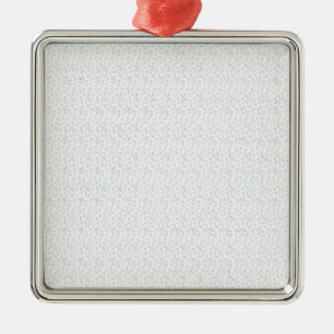 A completely white, featureless surface fills the metal ornament