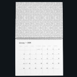 A contemporary wallpaper design showcasing an arra calendar<br><div class="desc">Add a touch of elegance to your decor with this stunning wallpaper design featuring an array of shapes in shades of white and grey. Whether used as an accent wall or to adorn an entire room, this contemporary pattern is sure to impress with its subtle yet impactful presence.</div>