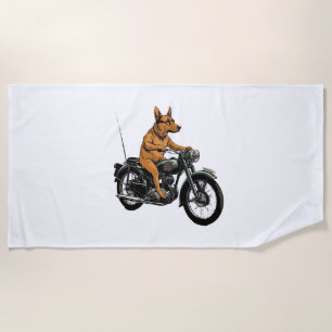 A Cool Dog Riding a Motorcycle Beach Towel