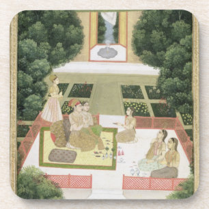 A couple in a garden listening to music with femal coaster