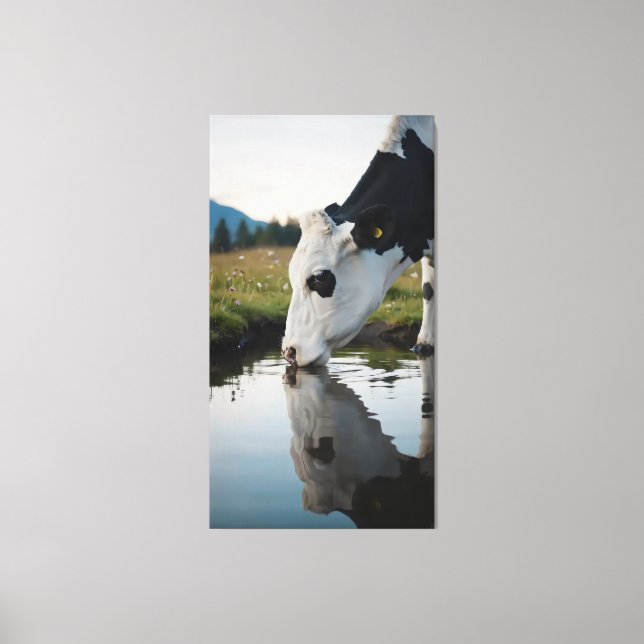 A cow drinks water in a natural stream canvas print (Front)
