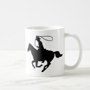 A cowboy riding with a lasso. coffee mug