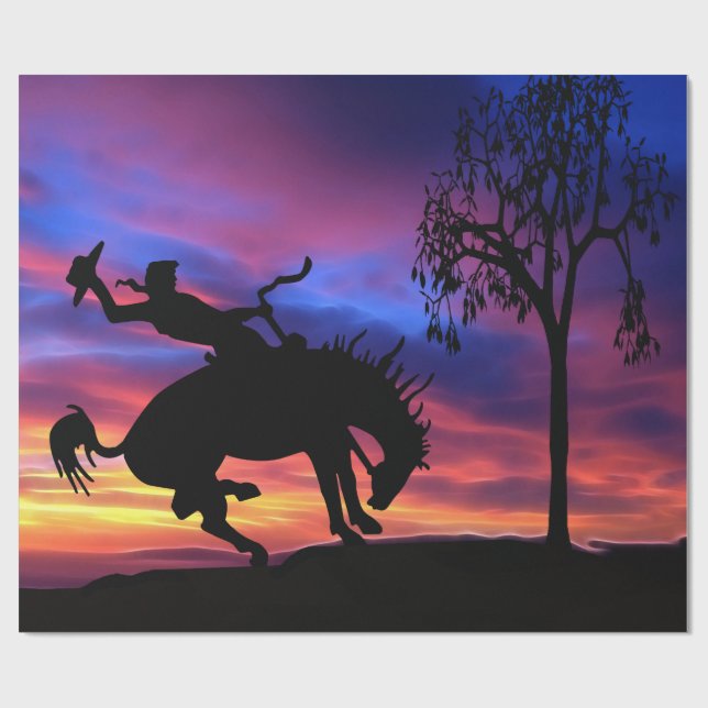 A cowboy silhouette at sunset wrapping paper (Flat)