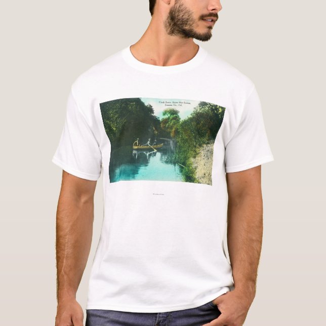 A Creek Scene with Family in a Canoe T-Shirt (Front)