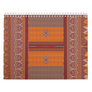 a cross stitch pattern in orange and brown calendar