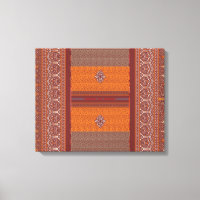 a cross stitch pattern in orange and brown