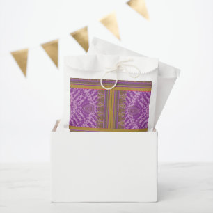 a cross stitch pattern with a purple and yellow b favour bag