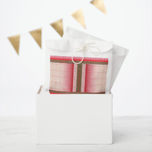 a cross stitch pattern with a red background favour bag