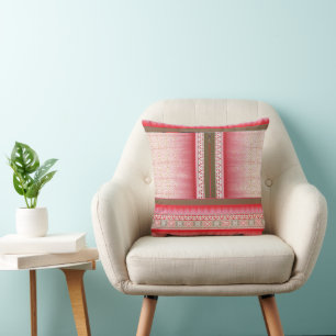 a cross stitch pattern with a red background throw pillow