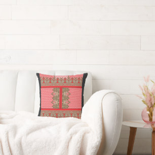 a cross stitch pattern with a red border throw pillow
