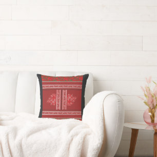 a cross stitch pattern with red flowers and vines throw pillow