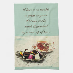 A cup of tea and sweets with quote kitchen towel