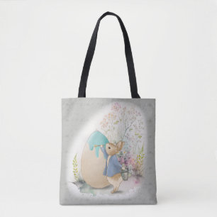 a cute Easter bunny with a basket of eggs Tote Bag