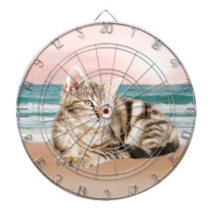 A Cuter Striped Cat Sitting on Beach with sunset Dartboard