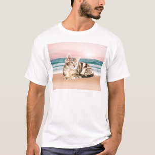 A Cuter Striped Cat Sitting on Beach with sunset T-Shirt