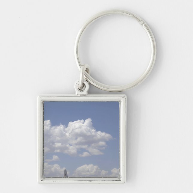 A CV-22 Osprey flies over a C-130 Hercules Keychain (Front)