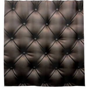 A dark leather cushion background, from a car seat
