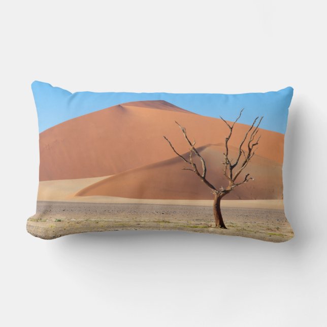 A dead tree on a desert plain with dunes lumbar pillow (Front)