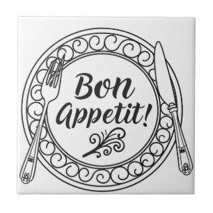 A decorative bon appetit sign with fork and knife  tile