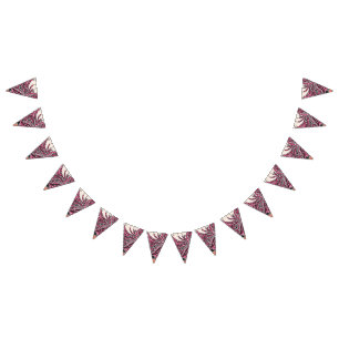 A decorative paisley design with vivid red and pin bunting flags