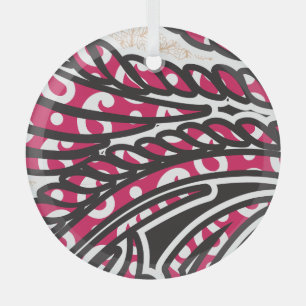 A decorative paisley design with vivid red and pin glass ornament