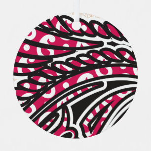 A decorative paisley design with vivid red and pin metal ornament