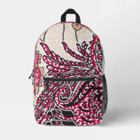 A decorative paisley design with vivid red and pin