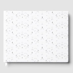 A decorative pattern featuring white and grey leav guest book