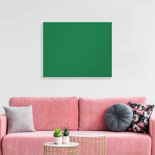A deep green background contrasted by a crisp whit canvas print (Insitu(LivingRoom))