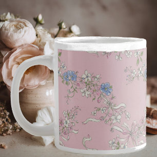 a delicate bouquet of wildflowers on a pink backgr large coffee mug