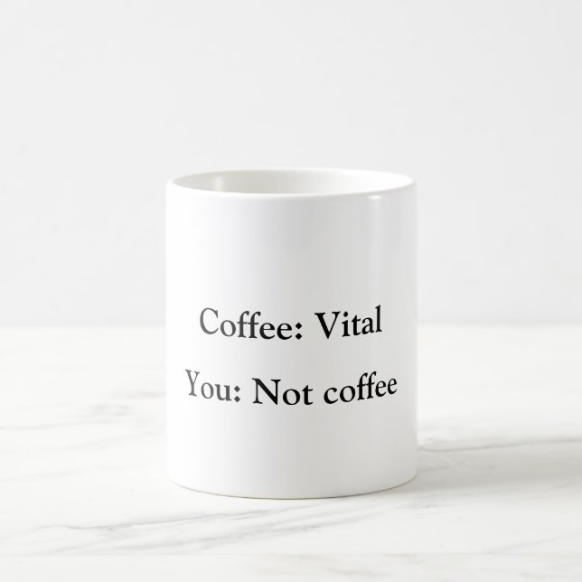 A delightfully funny mug for a coffee lover. (Center)
