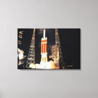 A Delta IV Heavy rocket lifts off