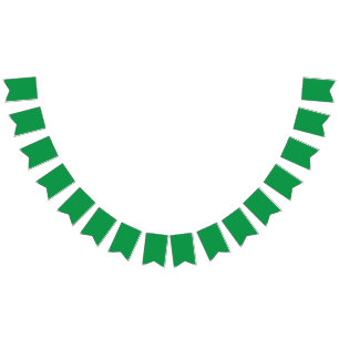 A dense, lush forest filled with vibrant green tre bunting flags