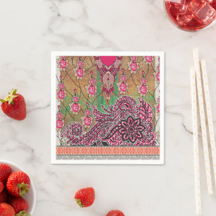 a design of a pink and brown paisley pattern napkin