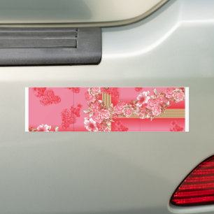 a design of a pink and gold background with a red  bumper sticker