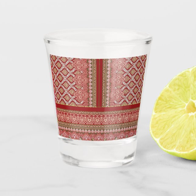 a design of a red and beige pattern_ shot glass (Front)