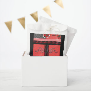 a design of a red and black wallpaper favour bag