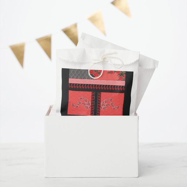 a design of a red and black wallpaper favour bag (Party)
