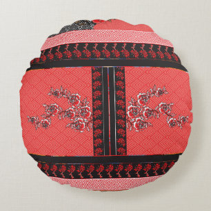 a design of a red and black wallpaper round pillow
