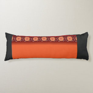 a design of a red and gold pattern body pillow