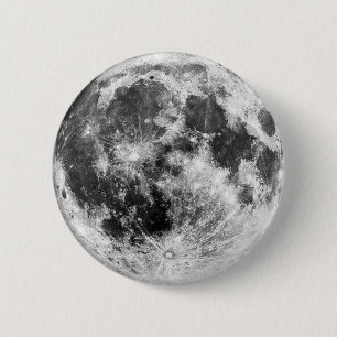 A distinctive brooch with a moon motif 2 inch round button