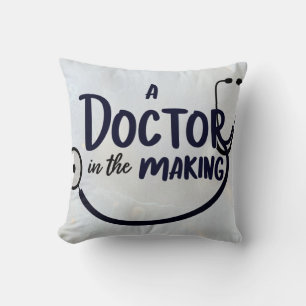 A doctor in the making throw pillow